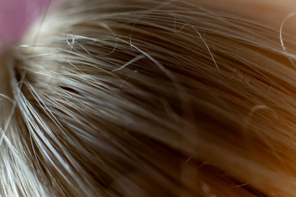 Side view of defined hair twists showing Frizz-Free Results after 3 days of wear